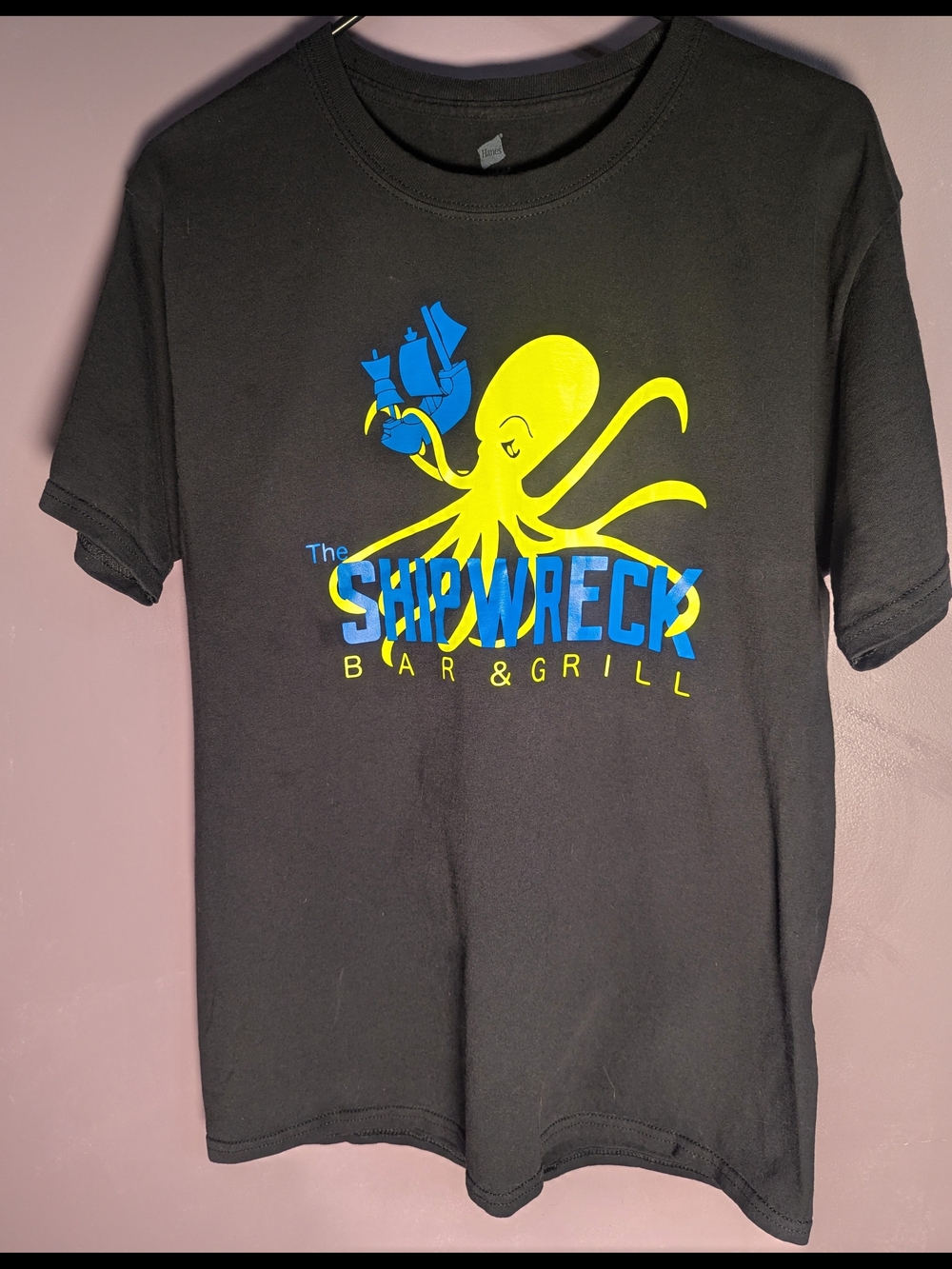The Shipwreck Bar & Grill Octopus Logo Tee - Black, Yellow & Blue Medium